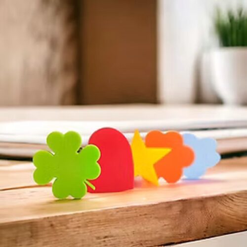 Alle fünf Ribbclip Formen nebeneinander: Kleeblatt, Herz, Stern, Blume und Wolke